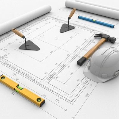 Architectural drawing of house foundations on a blueprint, tools, and a hard hat